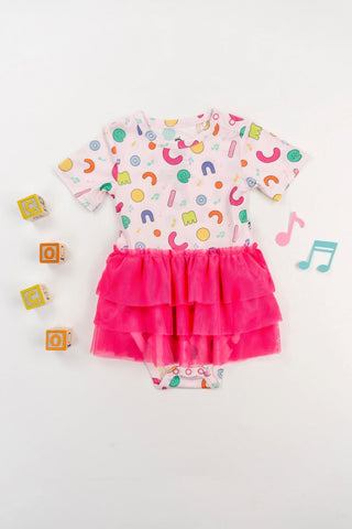 Dream Big Little Co x CoComelon Alphabet Dream Tutu Short Sleeve Bodysuit DressThe Dream Tutu Bodysuit DressDREAM BIG LITTLE COSize: 0-3M