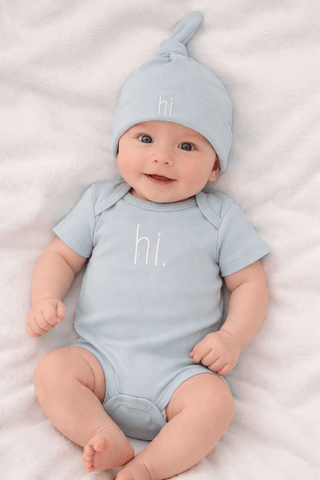 Hi. Embroidered Surf Blue Cotton Knit Onesie for Baby Huggalugs Size: 0-3 months