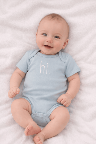 Hi. Embroidered Surf Blue Cotton Knit Onesie for Baby Huggalugs Size: 0-3 months
