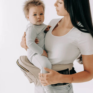 The Tushbaby Hip Carrier Baby & Toddler Tushbaby Color: Vegan Leather Cream Design: Tushbaby