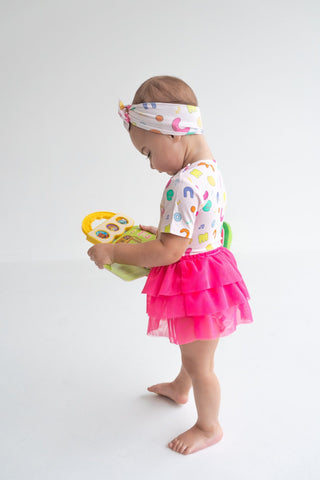 Dream Big Little Co x CoComelon Alphabet Dream Tutu Short Sleeve Bodysuit DressThe Dream Tutu Bodysuit DressDREAM BIG LITTLE COSize: 0-3M