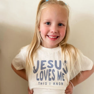 Jesus Loves Me This I Know (Kids) POD - Apparel Ivy + Cloth Style: Toddler Tee Color: White Size: 2T