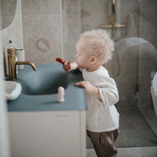Finger ToothbrushToothbrushMushieColor: Shifting Sand/Cambridge Blue