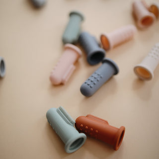 Finger ToothbrushToothbrushMushieColor: Shifting Sand/Cambridge Blue