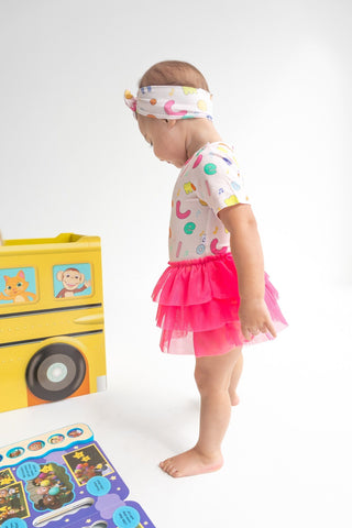 Dream Big Little Co x CoComelon Alphabet Dream Tutu Short Sleeve Bodysuit DressThe Dream Tutu Bodysuit DressDREAM BIG LITTLE COSize: 0-3M