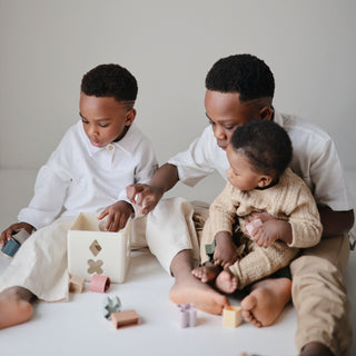 Shape Sorting Box toys Mushie Color: Petal