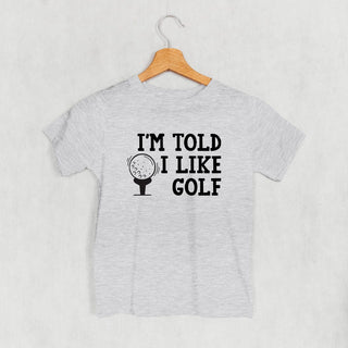I'm Told I Like Golf Tee (Kids) POD - Apparel Ivy + Cloth Style: Toddler Tee Color: Heather Size: 2T