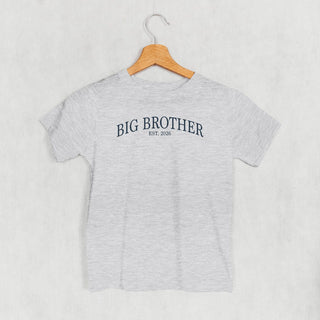 Big Brother Est 2026 Tee (Kids) POD - Apparel Ivy + Cloth Style: Toddler Tee Color: Heather Size: 2T