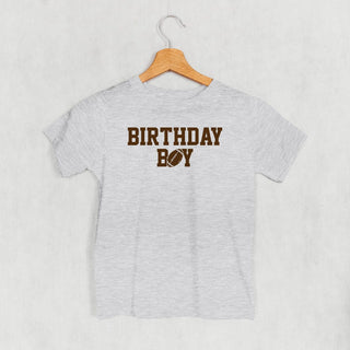 The Birthday Boy Football Tee (Kids) POD - Apparel Ivy + Cloth Style: Toddler Tee Color: Heather Size: 2T