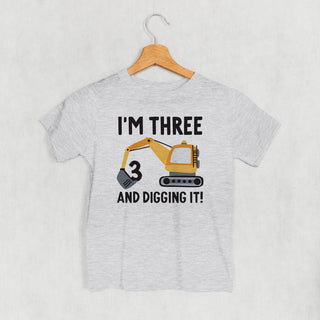 I'm 3 And Digging It Tee (Kids) POD - Apparel Ivy + Cloth Style: Toddler Tee Color: Heather Size: 2T