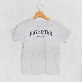Big Sister 2026 Bow Tee (Kids) POD - Apparel Ivy + Cloth Style: Toddler Tee Color: Heather Size: 2T