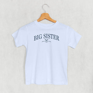 Big Sister 2026 Bow Tee (Kids) POD - Apparel Ivy + Cloth Style: Toddler Tee Color: Light Blue Size: 2T