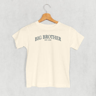 Big Brother Est 2026 Tee (Kids) POD - Apparel Ivy + Cloth Style: Toddler Tee Color: Natural Size: 2T