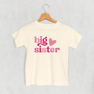 Big Sister Pink Heart Tee (Kids) POD - Apparel Ivy + Cloth Style: Toddler Tee Color: Natural Size: 2T