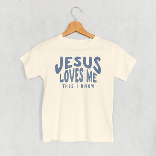 Jesus Loves Me This I Know Tee (Kids) POD - Apparel Ivy + Cloth Style: Toddler Tee Color: Natural Size: 2T