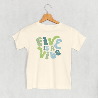 Five Is A Vibe Tee (Blue + Green) (Kids) POD - Apparel Ivy + Cloth Style: Toddler Tee Color: Natural Size: 2T