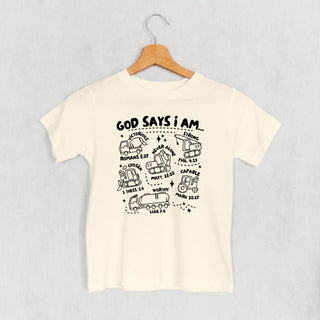 God Says I Am Tee (Kids) POD - Apparel Ivy + Cloth Style: Toddler Tee Color: Natural Size: 2T