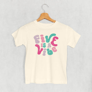 Five Is A Vibe Tee (Pink + Purple) (Kids) POD - Apparel Ivy + Cloth Style: Toddler Tee Color: Natural Size: 2T