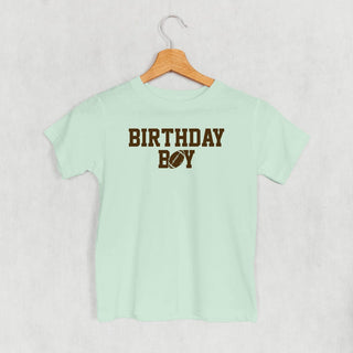 The Birthday Boy Football Tee (Kids) POD - Apparel Ivy + Cloth Style: Toddler Tee Color: Sage Size: 2T