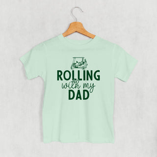 Rolling With My Dad Tee (Kids) POD - Apparel Ivy + Cloth Style: Toddler Tee Color: Sage Size: 2T