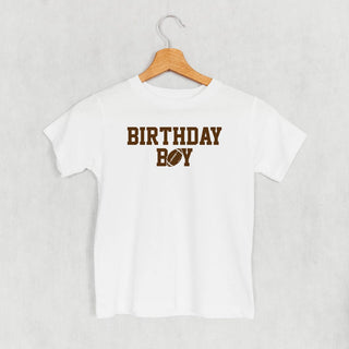 The Birthday Boy Football Tee (Kids) POD - Apparel Ivy + Cloth Style: Toddler Tee Color: White Size: 2T