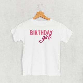 Birthday Girl Tee (Pink Sans Serif + Script) (Kids) POD - Apparel Ivy + Cloth Style: Toddler Tee Color: White Size: 2T