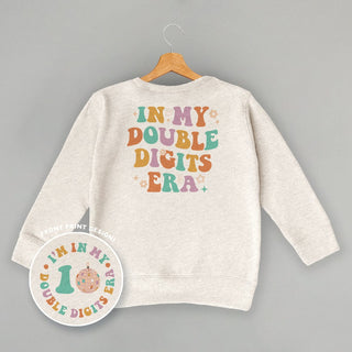 In My Double Digits Era Tee (Kids Back Print) POD - Apparel Ivy + Cloth Style: Toddler Tee Color: Natural Size: 2T