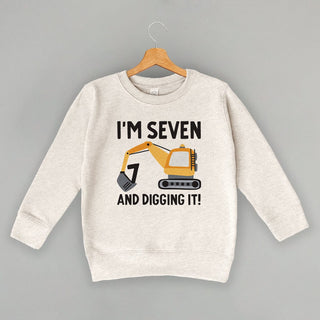 I'm 7 And Digging It Tee (Kids) POD - Apparel Ivy + Cloth Style: Toddler Crewneck Color: Natural Heather Size: 2T