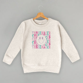 Threenager Tee (Pink + Purple) (Kids) POD - Apparel Ivy + Cloth Style: Toddler Crewneck Color: Natural Heather Size: 2T
