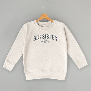 Big Sister 2026 Bow Tee (Kids) POD - Apparel Ivy + Cloth Style: Toddler Crewneck Color: Natural Heather Size: 2T