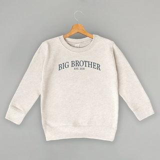 Big Brother Est 2026 Tee (Kids) POD - Apparel Ivy + Cloth Style: Toddler Crewneck Color: Natural Heather Size: 2T