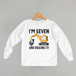I'm 7 And Digging It Tee (Kids) POD - Apparel Ivy + Cloth Style: Youth Long Sleeve Color: White Size: YS