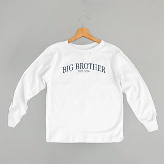 Big Brother Est 2026 Tee (Kids) POD - Apparel Ivy + Cloth Style: Toddler Long Sleeve Color: White Size: 2T