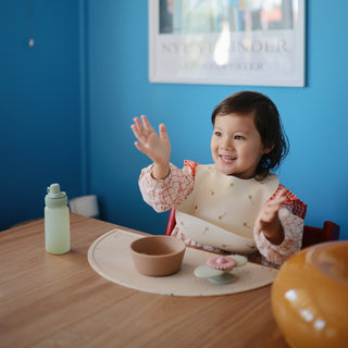Silicone Baby BibSilicone BibMushieColor: Smiley Face