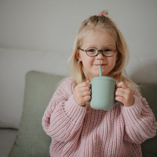 Silicone Training Cup + StrawSippy CupsMushieColor: Dinosaurs