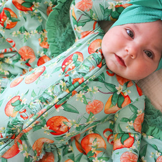 Bamboo Ruffle Footie with 2-Way Zipper - Arancia (Citrus) Baby & Toddler Sleepwear Posh Peanut Size: Newborn