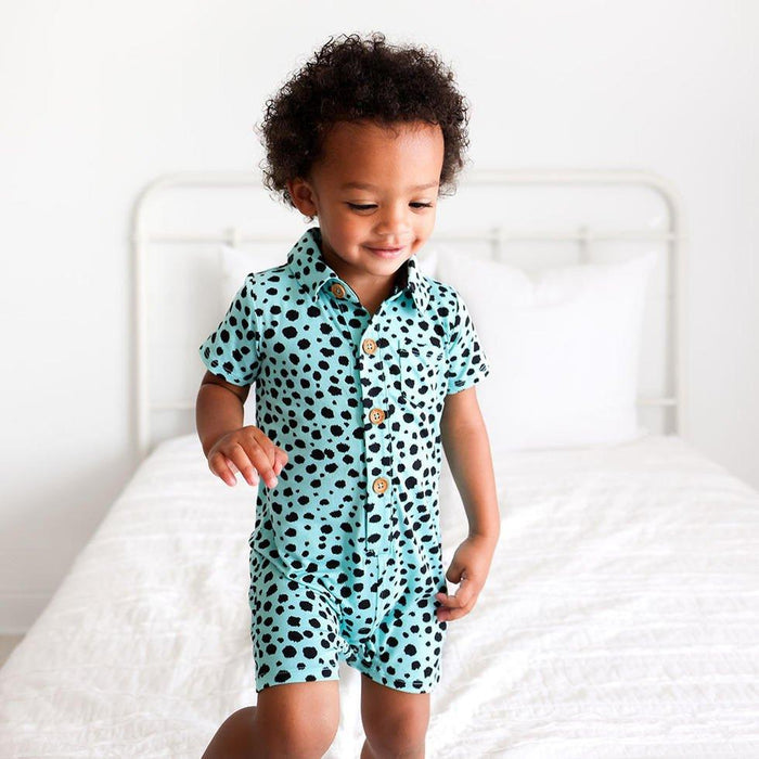Posh Peanut boys short sleeve collared henley shorts romper in Pebbles