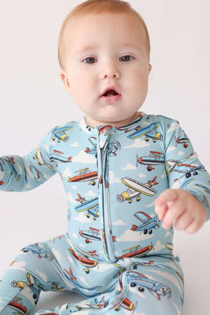 Posh Peanut footie with 2-way zipper in Posh Planes