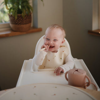 Silicone Baby BibSilicone BibMushieColor: Smiley Face